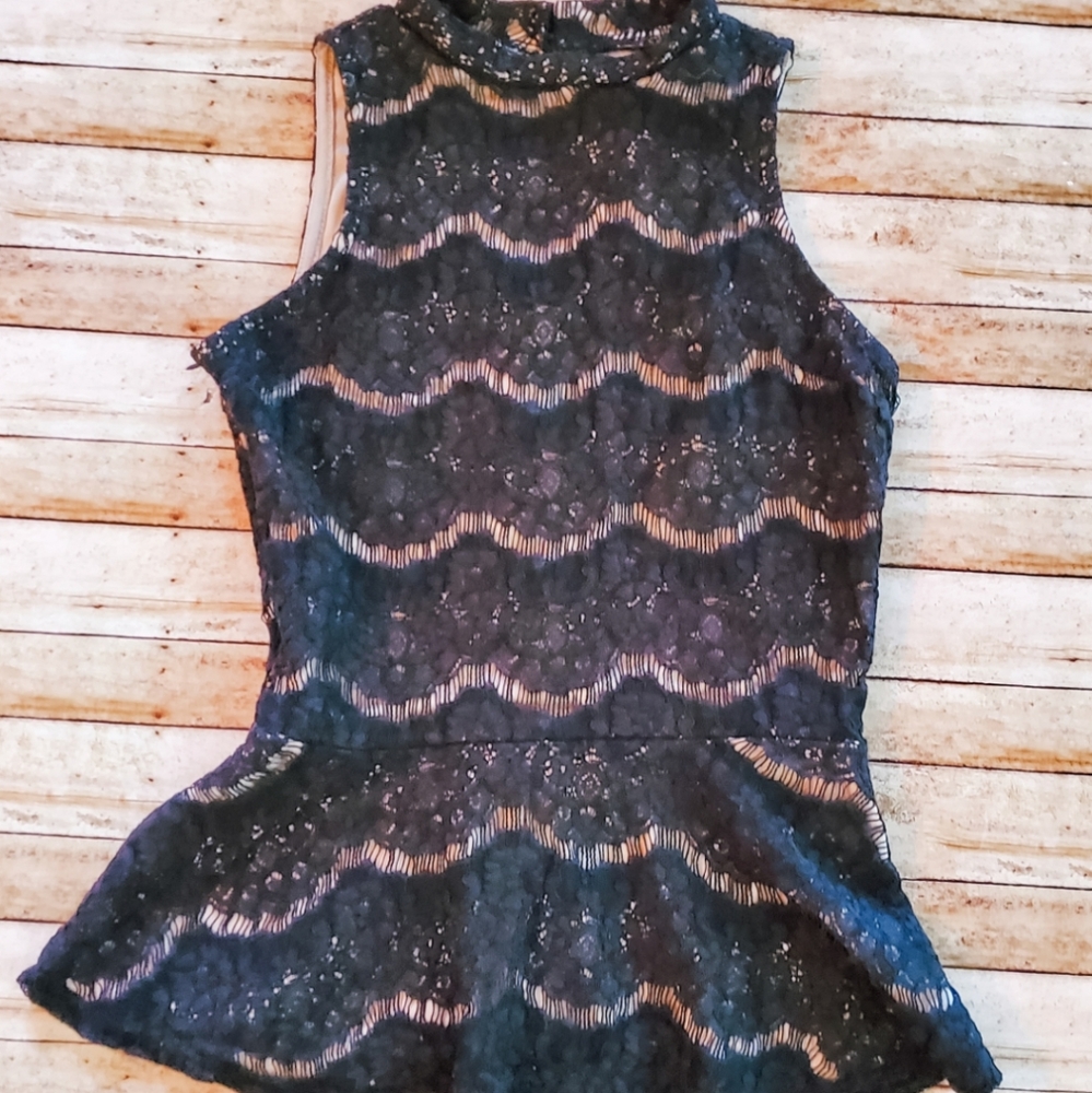 Lace Peplum Sleeveless top